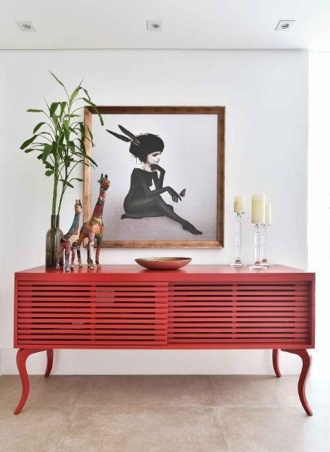 Living room console detail with framed artwork and decorative accents, Aadesh Bandekar Residence