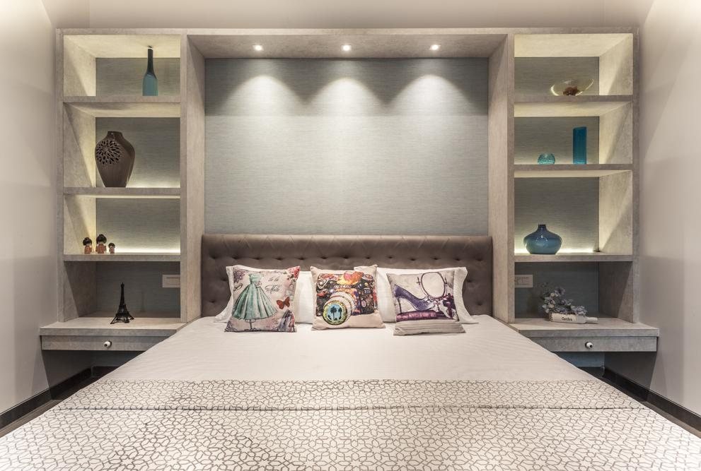 Farmhouse bedroom with a sophisticated built-in display unit
