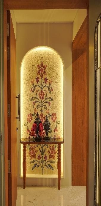Karpe Residence arched console niche with decorative wall art