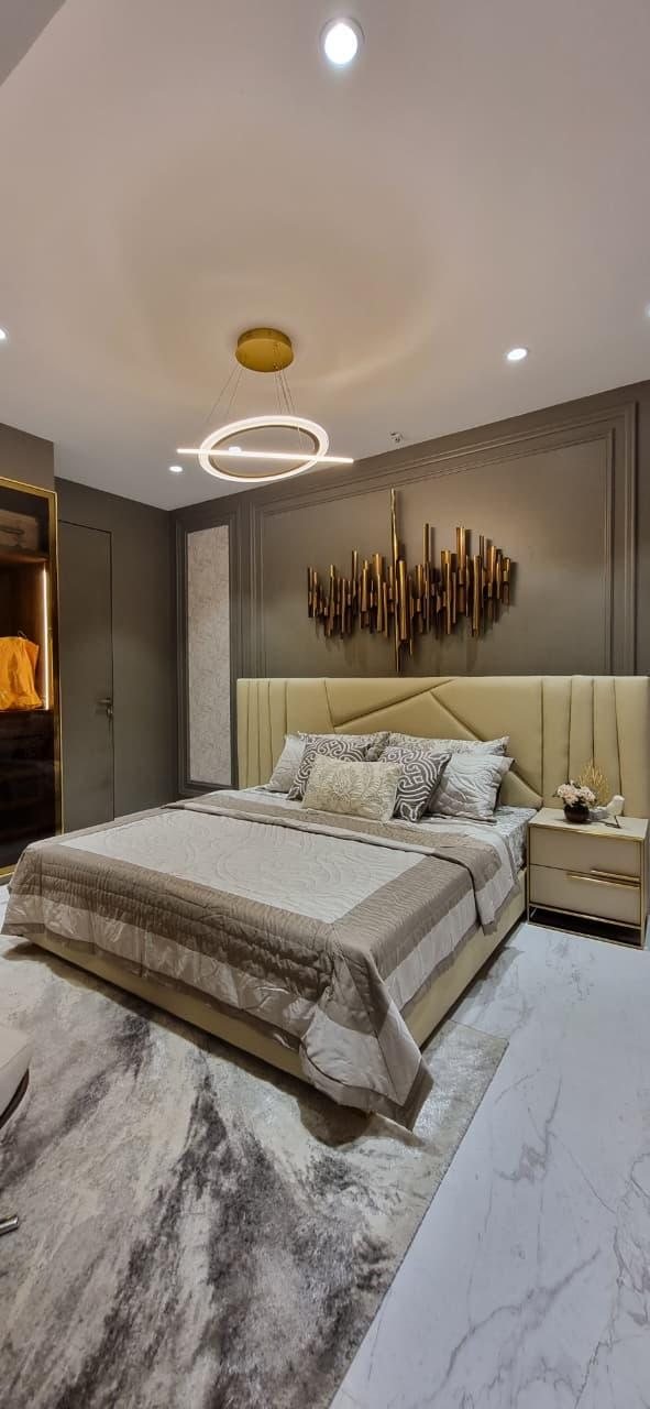 Show flat bedroom at Ruparel Jewels, Parel, in neutral tones