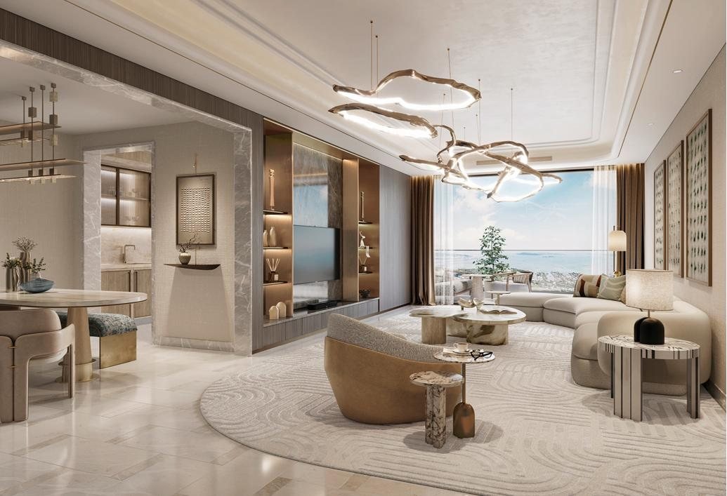 Show flat living room in Mahalaxmi with gold accents, sheer curtains and a city skyline view